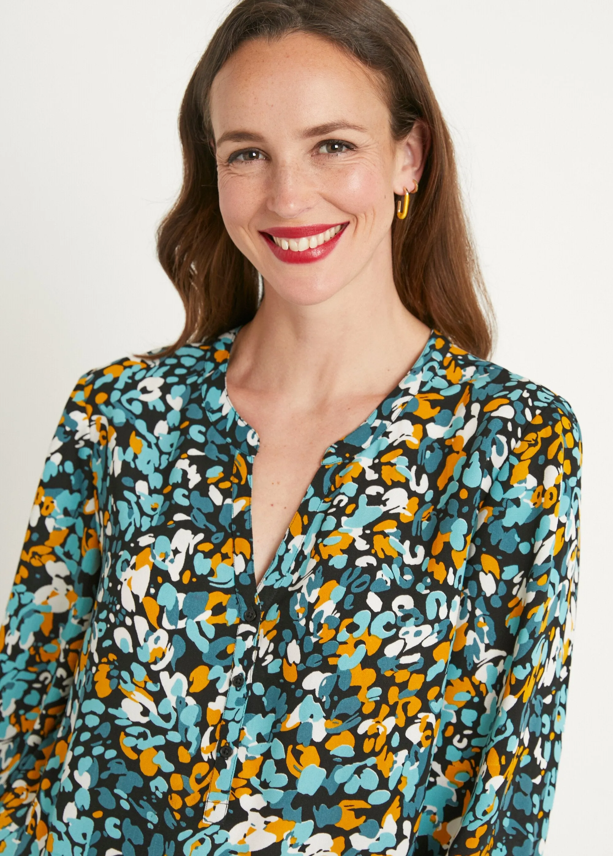 Long, loose-fitting button-down tunic