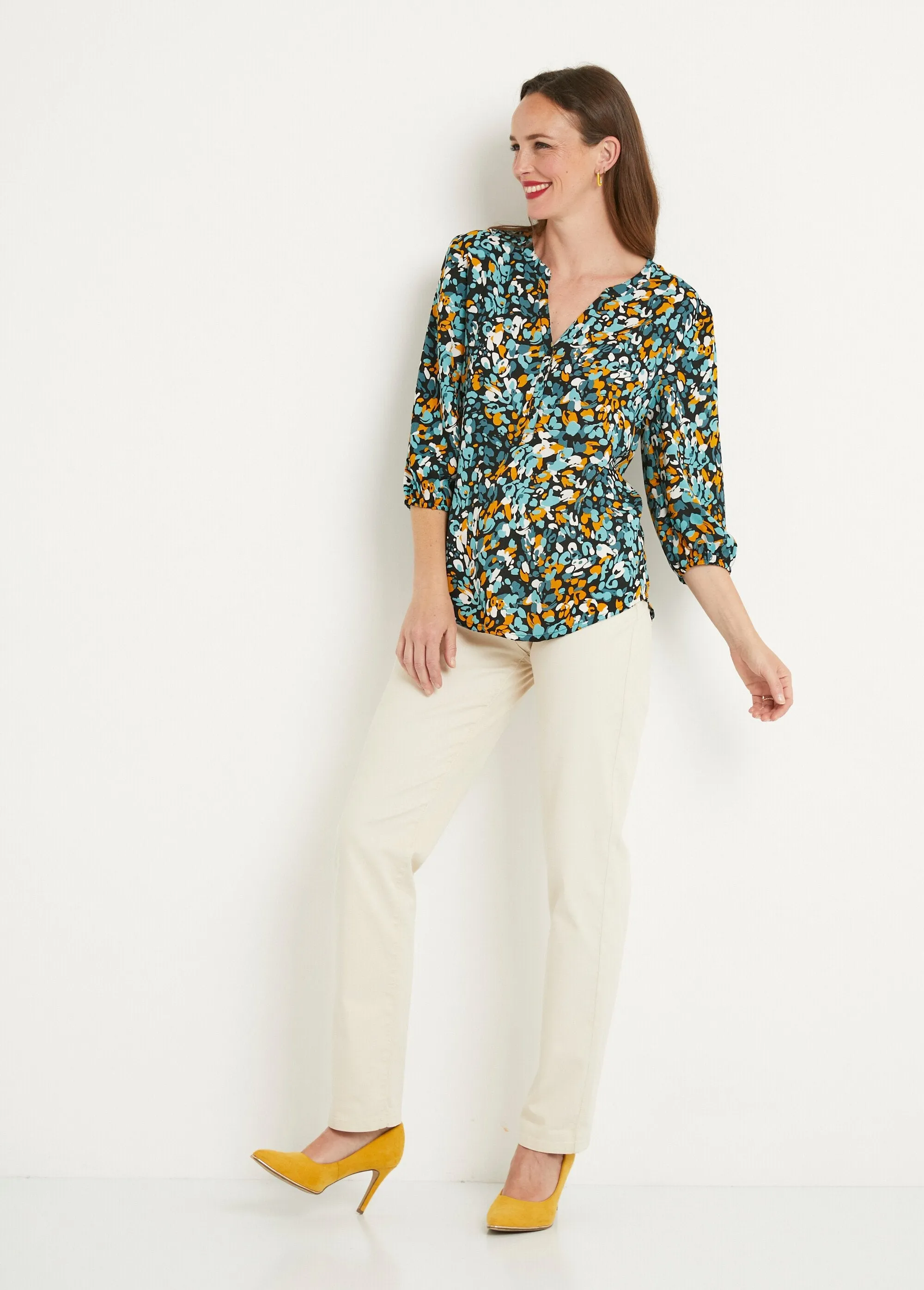 Long, loose-fitting button-down tunic