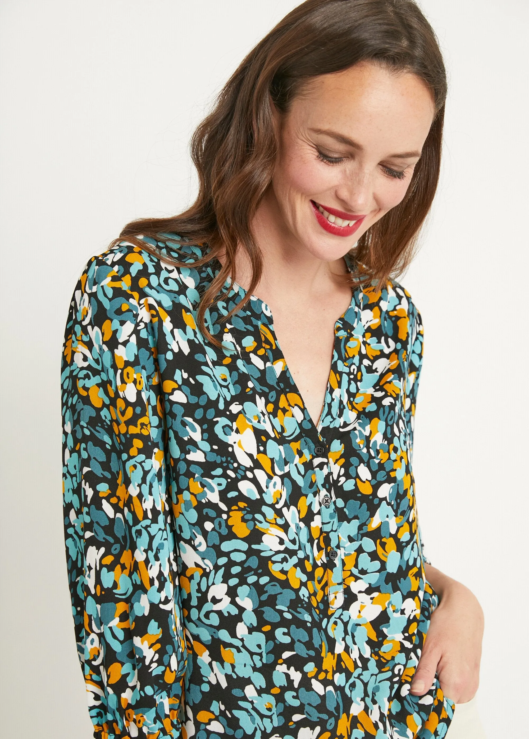 Long, loose-fitting button-down tunic